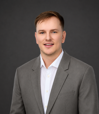 Portrait of Peyton Wilson, Realtor.